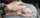 A senior puts their hand onto the hands of another senior