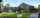 architectural rendering of the Morwick Ground Water Research Centre, grey building on green grass