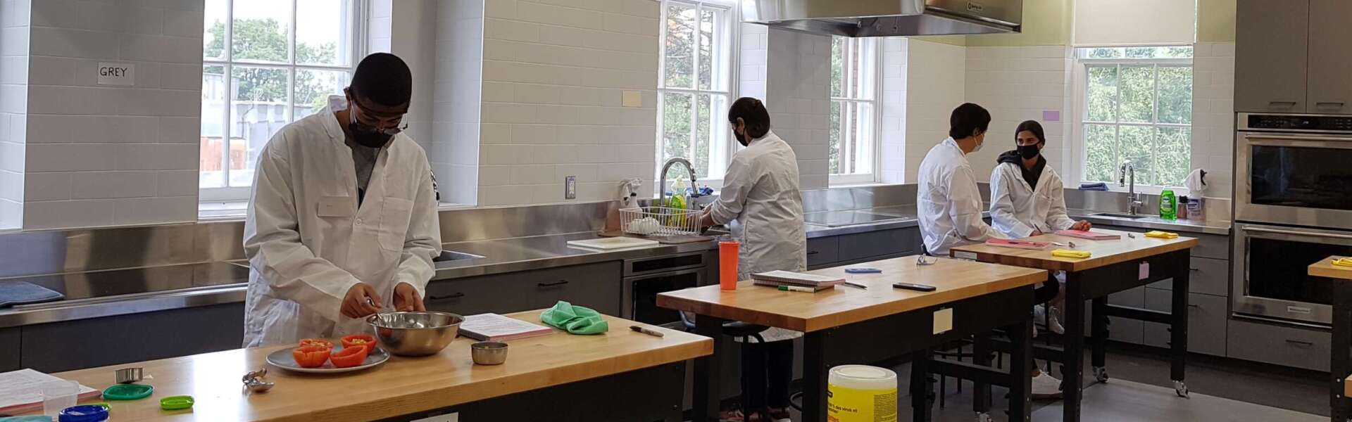 interior of food lab with four students