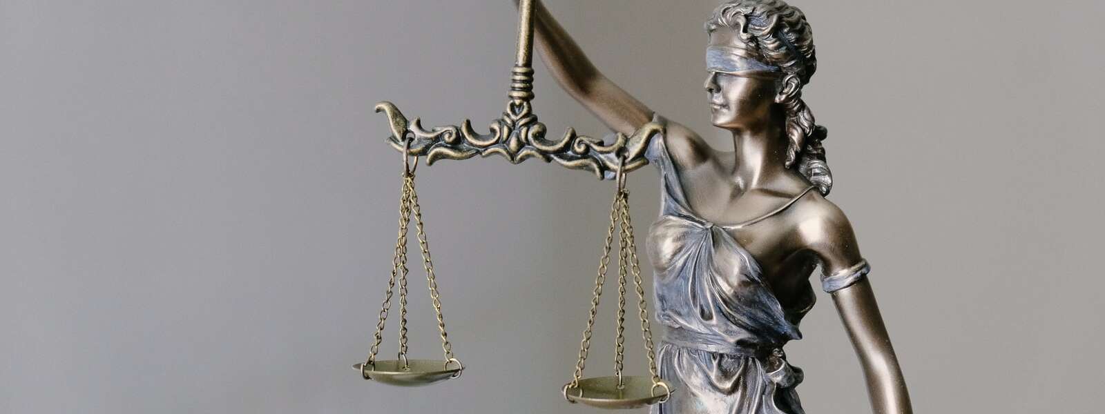 Lady Justice holding scales of justice