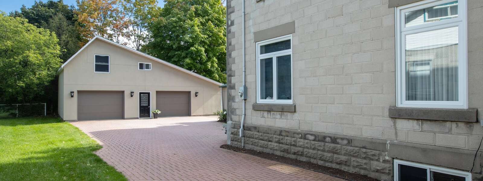 A beige house and garage.