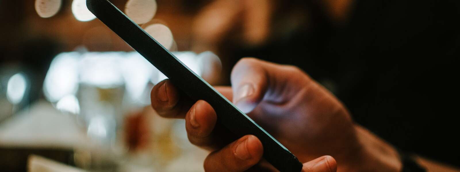 A person holding smartphone