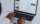 Person Using Macbook Pro on White Table