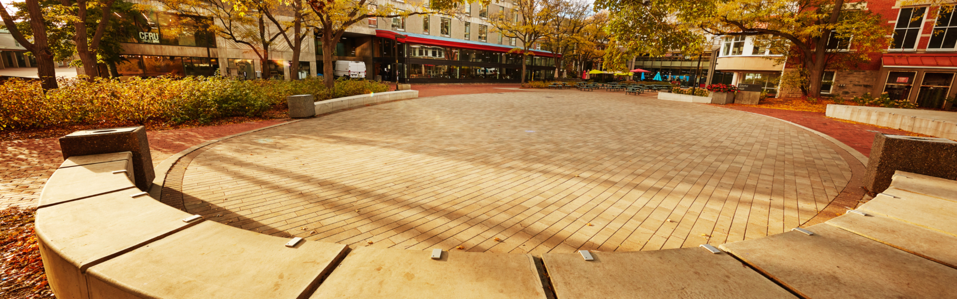The semi-circle of cement benches in Branion Plaza.