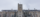 Johnston Hall against a cloudy sky on a snowy day.