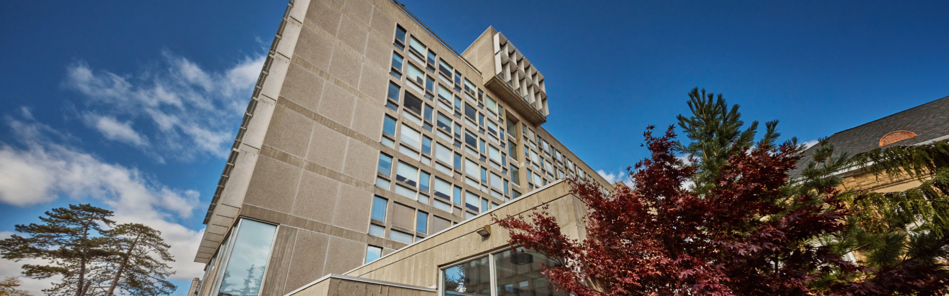 The MacKinnon building against a blue sky.