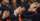 A zoomed-in shot of a row of hands clapping at a convocation ceremony