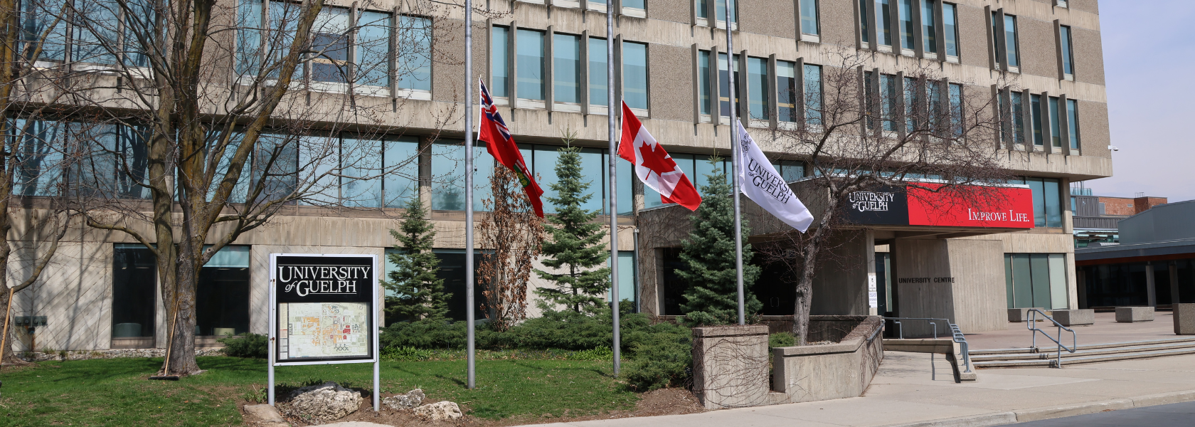 The flags in front of the University Centre are at half-mast.