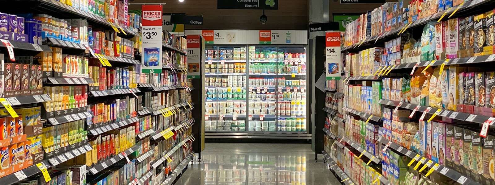 white and red labeled pack on white shelf